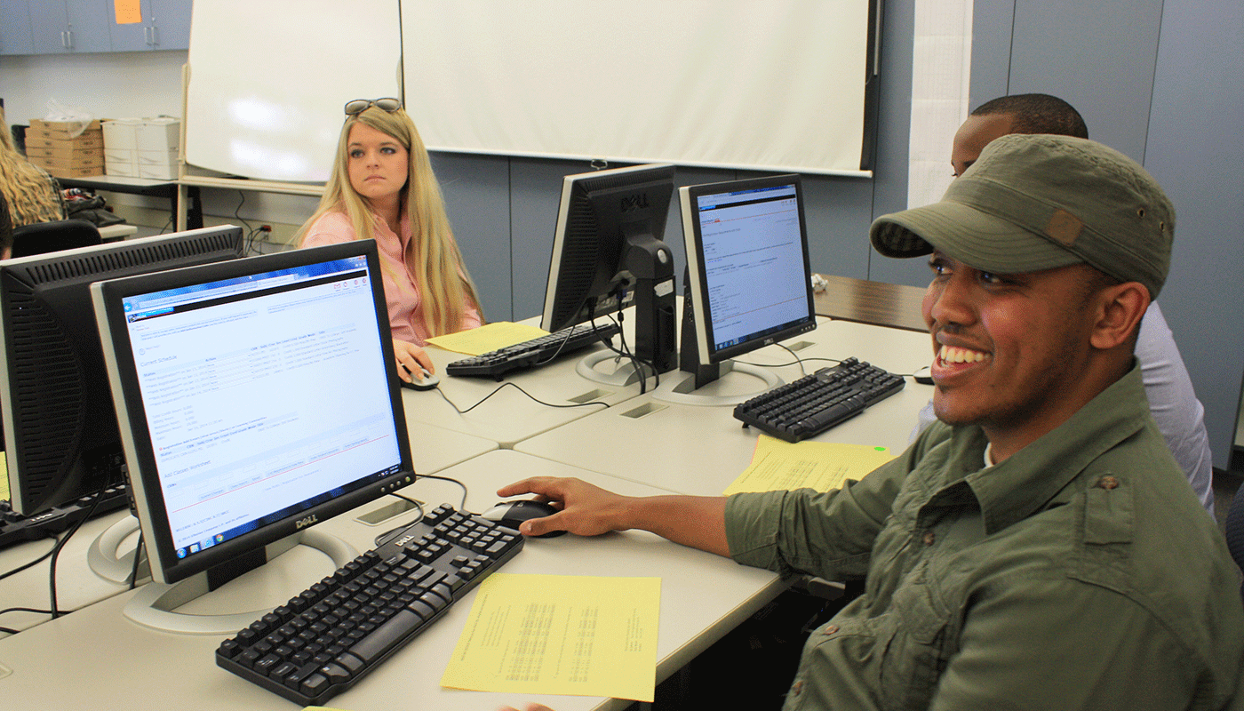 Students in classroom listening to instructor